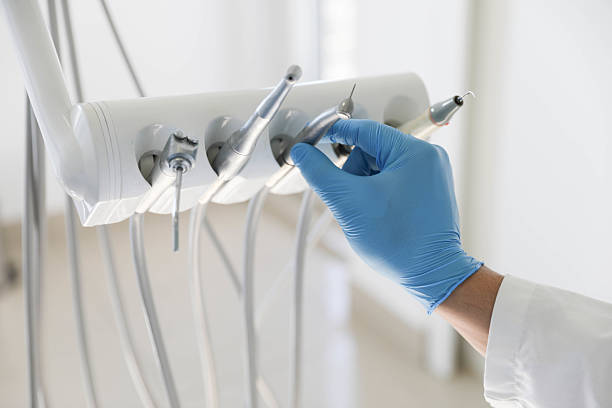 Professional Tooth Extraction technician working in Newport County County, RI